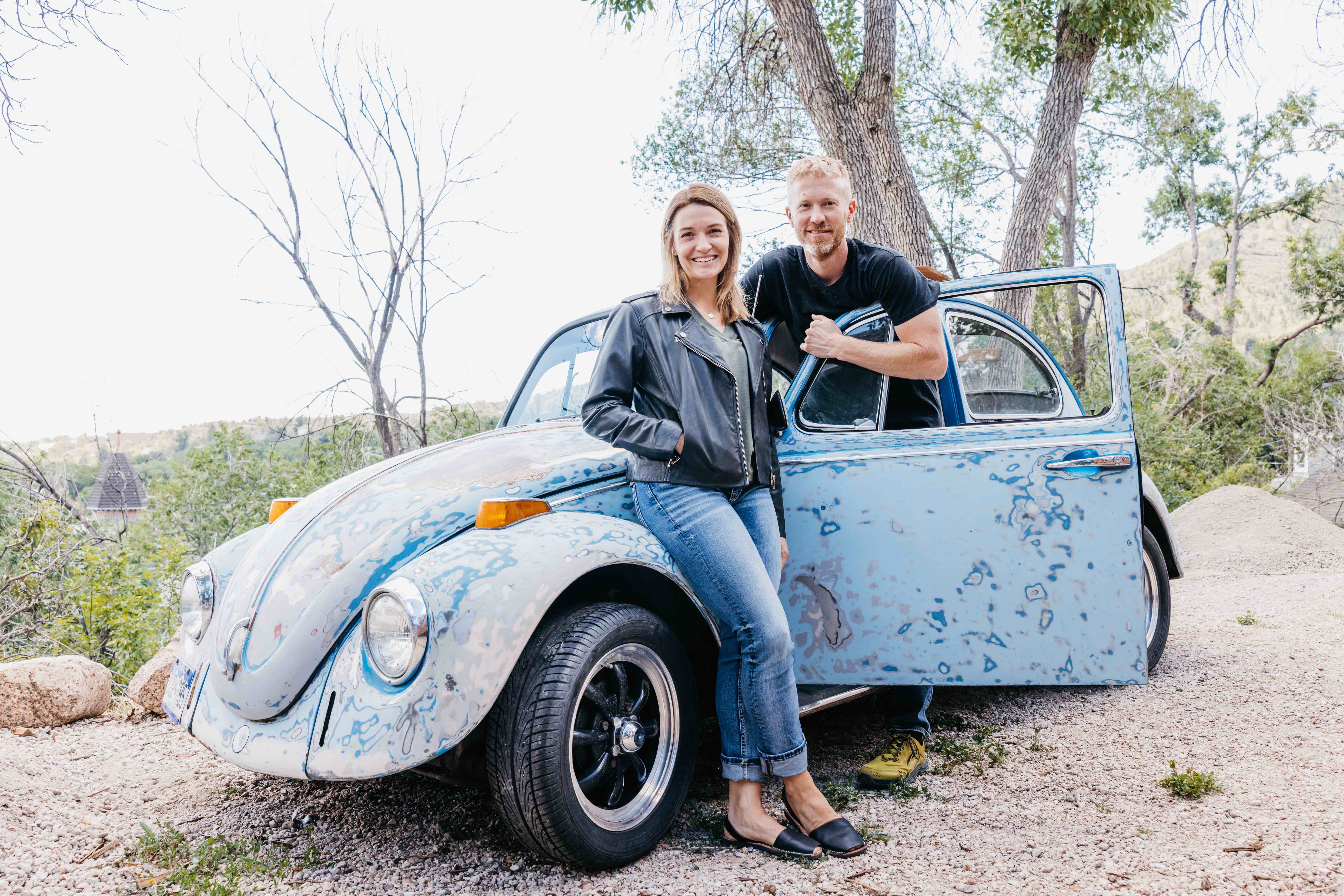 Megan and her husband next to their buggy Rosco